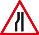 Road narrows left side 
